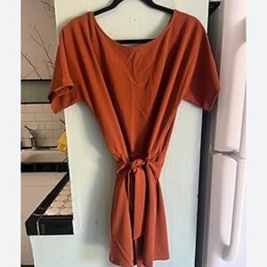 Brand new** mauve rose romper with belt